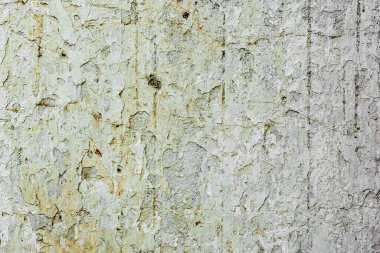 Doku, duvar, beton, arka plan olarak kullanılabilir. Çizik ve çatlaklarla dolu bir duvar parçası.