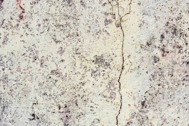 Doku, duvar, beton, arka plan olarak kullanılabilir. Çizik ve çatlaklarla dolu bir duvar parçası.