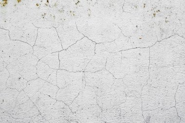 Doku, duvar, beton, arka plan olarak kullanılabilir. Çizik ve çatlaklarla dolu bir duvar parçası.