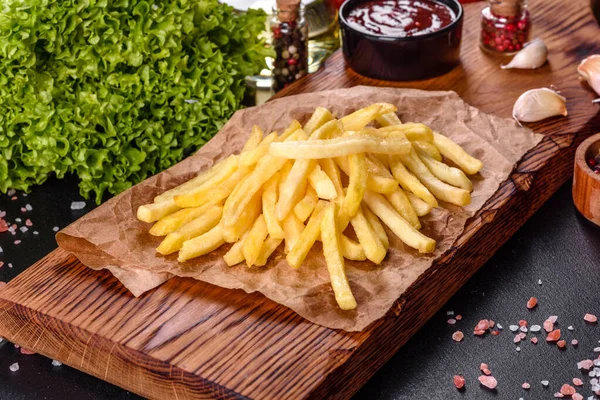 Fresh Hot French Fries Salt Vegetables Spices Dark Concrete Background — Stock Photo, Image