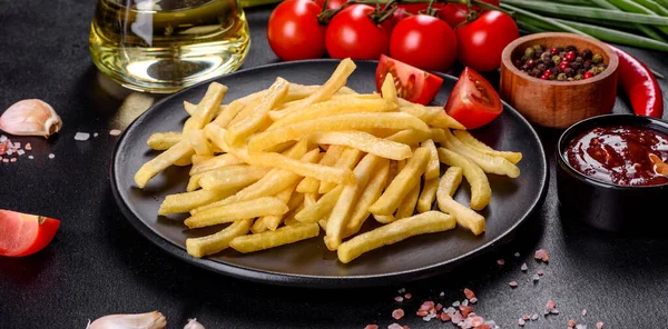 Fresh Hot French Fries Salt Vegetables Spices Dark Concrete Background — Stock Photo, Image
