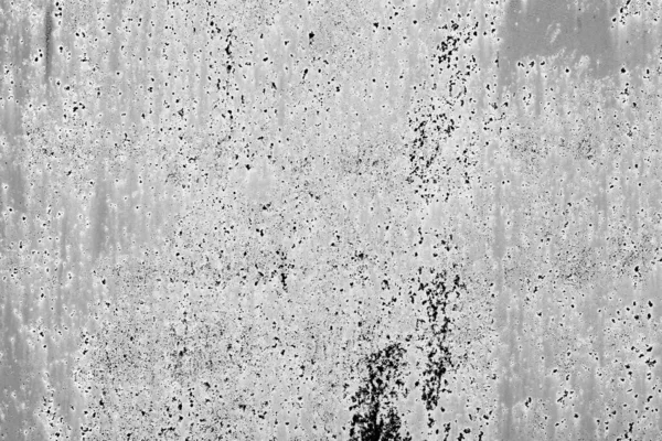 Texture of a metal wall with cracks and scratches which can be used as a background