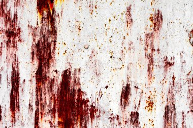 Çatlakları ve çizikleri olan metal bir duvarın dokusu arka plan olarak kullanılabilir.