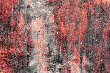 Çatlakları ve çizikleri olan metal bir duvarın dokusu arka plan olarak kullanılabilir.