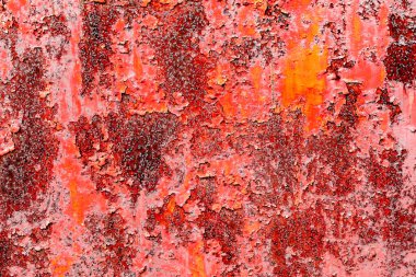 Çatlakları ve çizikleri olan metal bir duvarın dokusu arka plan olarak kullanılabilir.