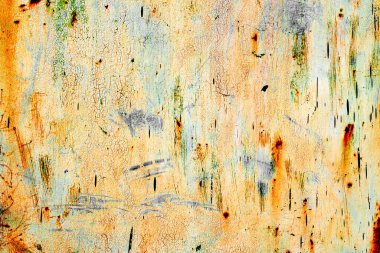 Çatlakları ve çizikleri olan metal bir duvarın dokusu arka plan olarak kullanılabilir.