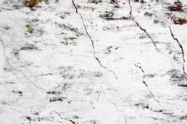 Doku, duvar, beton, arka plan olarak kullanılabilir. Çizik ve çatlaklarla dolu bir duvar parçası.