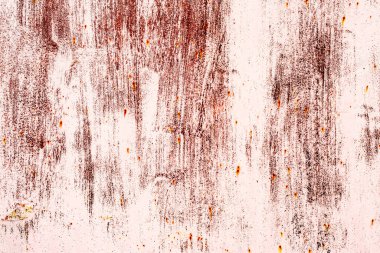 Çatlakları ve çizikleri olan metal bir duvarın dokusu arka plan olarak kullanılabilir.