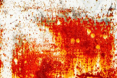 Çatlakları ve çizikleri olan metal bir duvarın dokusu arka plan olarak kullanılabilir.