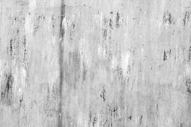 Çatlakları ve çizikleri olan metal bir duvarın dokusu arka plan olarak kullanılabilir.