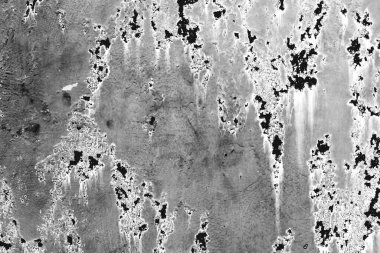 Çatlakları ve çizikleri olan metal bir duvarın dokusu arka plan olarak kullanılabilir.