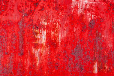 Çatlakları ve çizikleri olan metal bir duvarın dokusu arka plan olarak kullanılabilir.