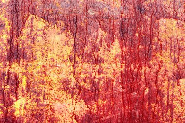 Çatlakları ve çizikleri olan metal bir duvarın dokusu arka plan olarak kullanılabilir.