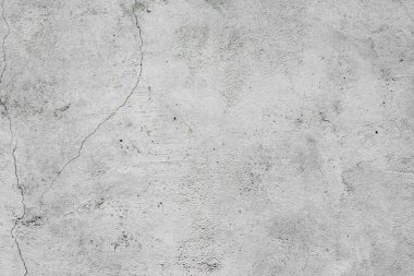 Doku, duvar, beton, arka plan olarak kullanılabilir. Çizik ve çatlaklarla dolu bir duvar parçası.