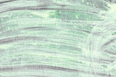 Çatlakları ve çizikleri olan metal bir duvarın dokusu arka plan olarak kullanılabilir.