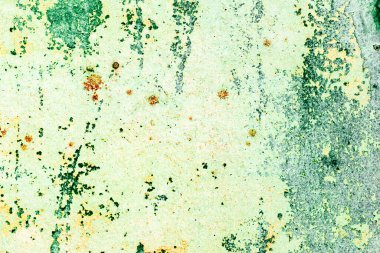 Çatlakları ve çizikleri olan metal bir duvarın dokusu arka plan olarak kullanılabilir.