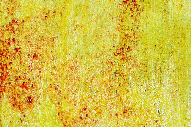 Çatlakları ve çizikleri olan metal bir duvarın dokusu arka plan olarak kullanılabilir.