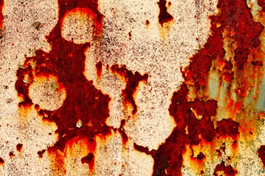 Çatlakları ve çizikleri olan metal bir duvarın dokusu arka plan olarak kullanılabilir.