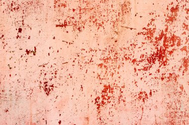 Çatlakları ve çizikleri olan metal bir duvarın dokusu arka plan olarak kullanılabilir.