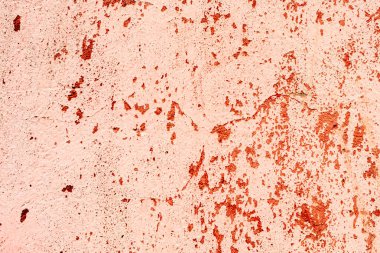 Çatlakları ve çizikleri olan metal bir duvarın dokusu arka plan olarak kullanılabilir.