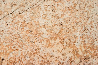 Doku, duvar, beton, arka plan olarak kullanılabilir. Çizik ve çatlaklarla dolu bir duvar parçası.