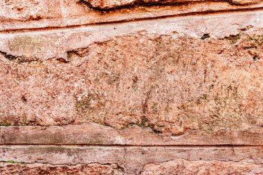 Doku, duvar, beton, arka plan olarak kullanılabilir. Çizik ve çatlaklarla dolu bir duvar parçası.