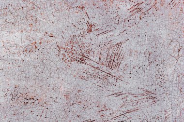 Doku, duvar, beton, arka plan olarak kullanılabilir. Çizik ve çatlaklarla dolu bir duvar parçası.