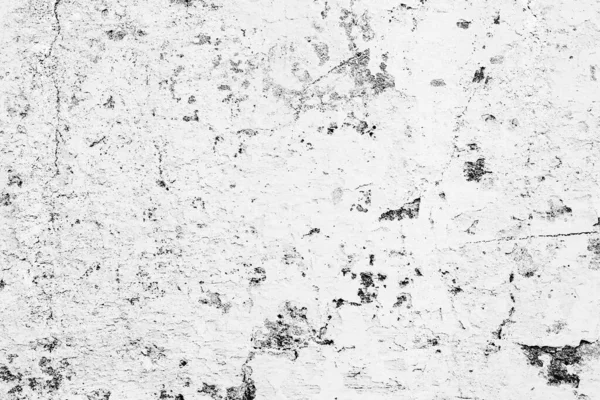 Doku, duvar, beton, arka plan olarak kullanılabilir. Çizik ve çatlaklarla dolu bir duvar parçası.