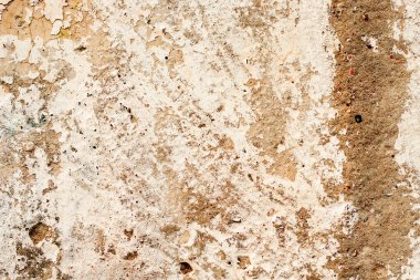 Doku, duvar, beton, arka plan olarak kullanılabilir. Çizik ve çatlaklarla dolu bir duvar parçası.