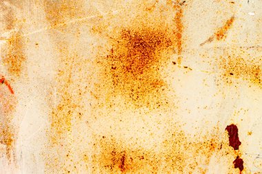 Çatlakları ve çizikleri olan metal bir duvarın dokusu arka plan olarak kullanılabilir.