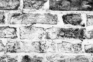 Çatlakları ve çizikleri olan tuğla duvar dokusu arka plan olarak kullanılabilir.