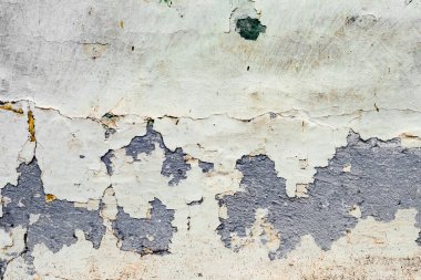 Doku, duvar, beton, arka plan olarak kullanılabilir. Çizik ve çatlaklarla dolu bir duvar parçası.
