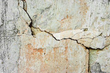 Doku, duvar, beton, arka plan olarak kullanılabilir. Çizik ve çatlaklarla dolu bir duvar parçası.