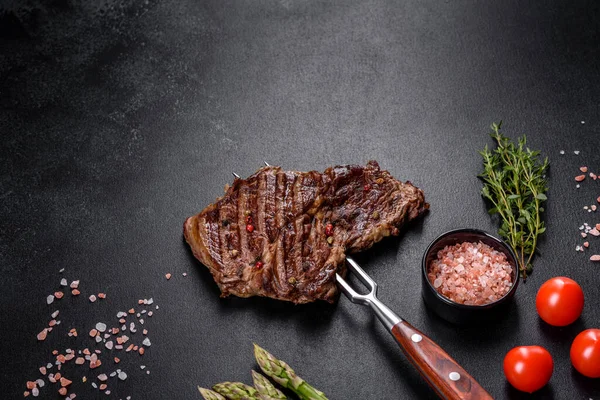 Delicious Juicy Fresh Beef Steak Spices Herbs Dark Concrete Background — Stock Photo, Image