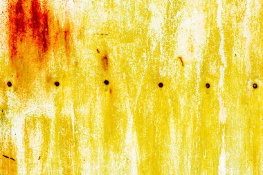 Çatlakları ve çizikleri olan metal bir duvarın dokusu arka plan olarak kullanılabilir.