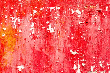 Çatlakları ve çizikleri olan metal bir duvarın dokusu arka plan olarak kullanılabilir.