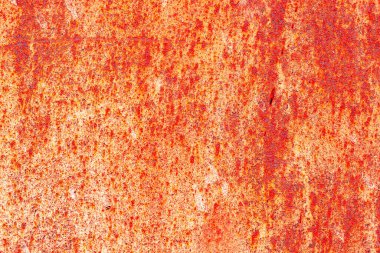 Çatlakları ve çizikleri olan metal bir duvarın dokusu arka plan olarak kullanılabilir.