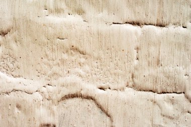 Doku, duvar, beton, arka plan olarak kullanılabilir. Çizik ve çatlaklarla dolu bir duvar parçası.