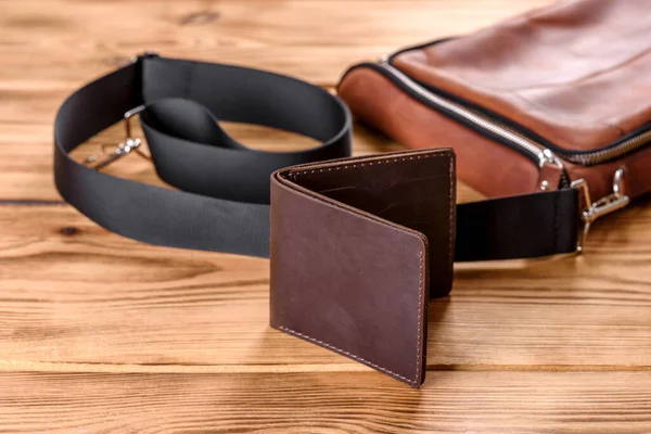 Beautiful leather brown purse made of leather to store paper money and credit cards