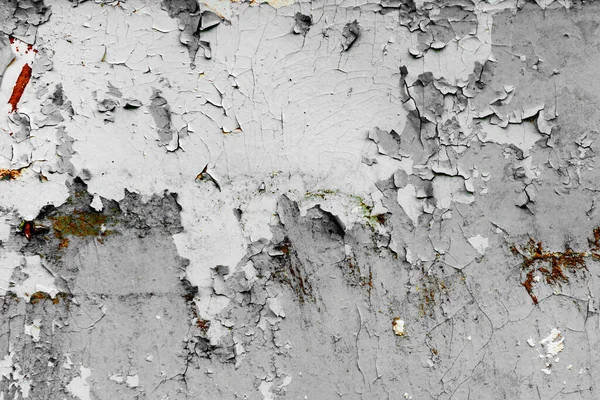 Texture of a metal wall with cracks and scratches which can be used as a background