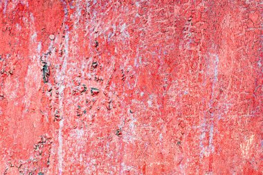 Çatlakları ve çizikleri olan metal bir duvarın dokusu arka plan olarak kullanılabilir.