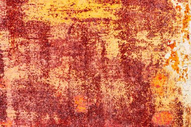 Çatlakları ve çizikleri olan metal bir duvarın dokusu arka plan olarak kullanılabilir.