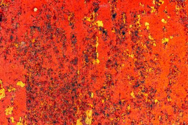 Çatlakları ve çizikleri olan metal bir duvarın dokusu arka plan olarak kullanılabilir.