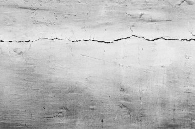 Doku, duvar, beton, arka plan olarak kullanılabilir. Çizik ve çatlaklarla dolu bir duvar parçası.
