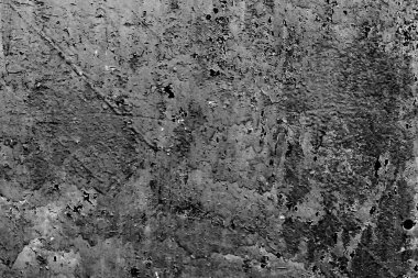 Çatlakları ve çizikleri olan metal bir duvarın dokusu arka plan olarak kullanılabilir.