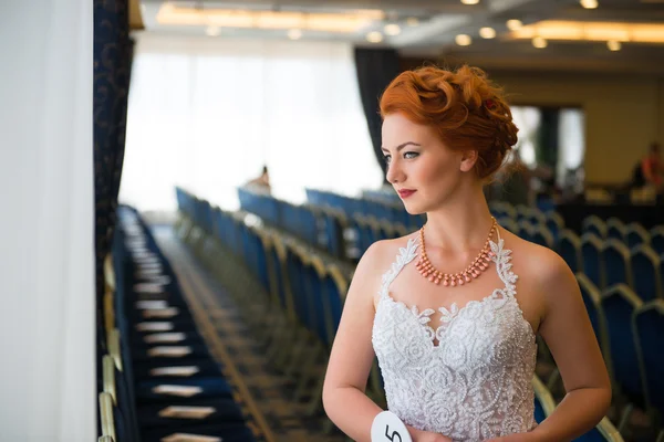 The beautiful girl in a wedding dress — Stock Photo, Image