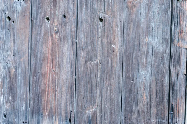 Struttura in legno con graffi e crepe, che può essere utilizzato come sfondo — Foto Stock