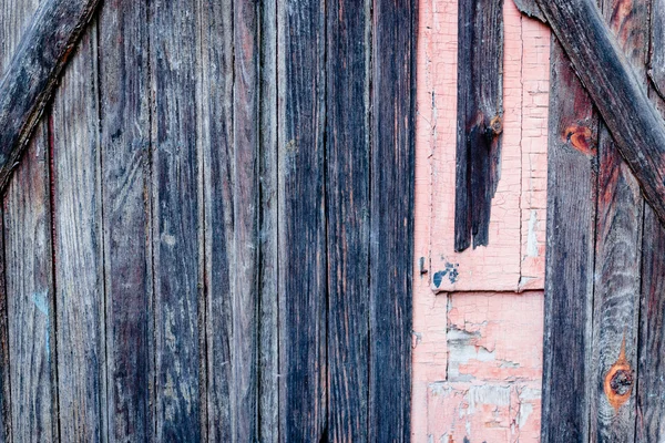 Textura de madera con arañazos y grietas, que se puede utilizar como fondo — Foto de Stock