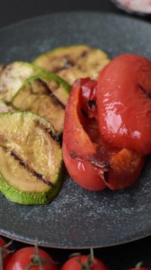 Grilled green zucchini slices, vegetarian food. Green barbecue zucchini