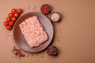 Raw minced chicken for a burger or as an ingredient in a meat dish. Raw ground chicken as a food background for your design